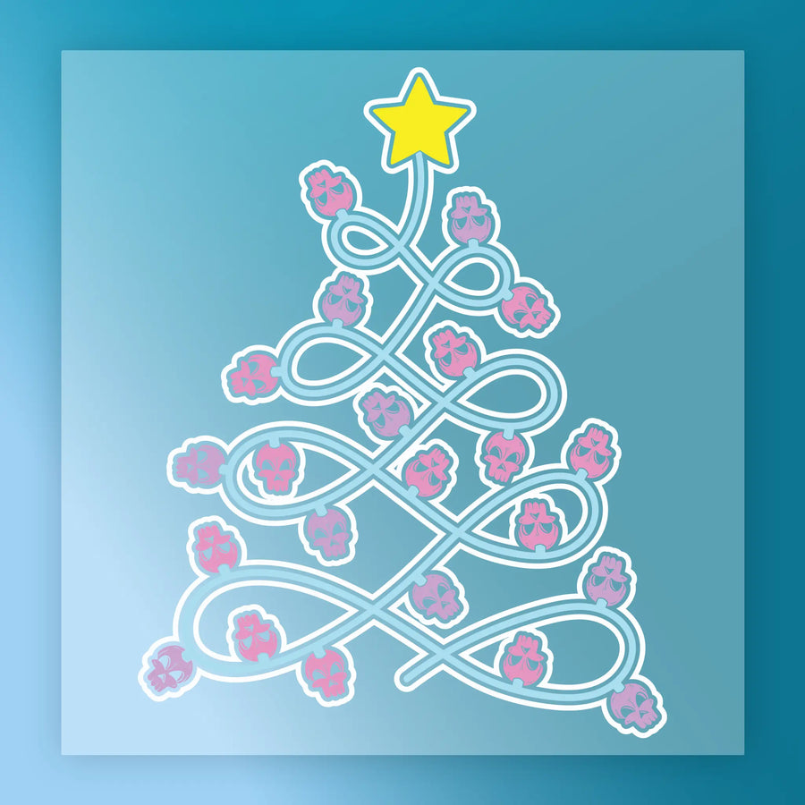 The InkMerge "Gothic Christmas Tree with Skulls - Heat Press Ready" design features white curly lines, pink flower accents, and a yellow star on blue—ideal for DTF transfer projects this holiday season.
