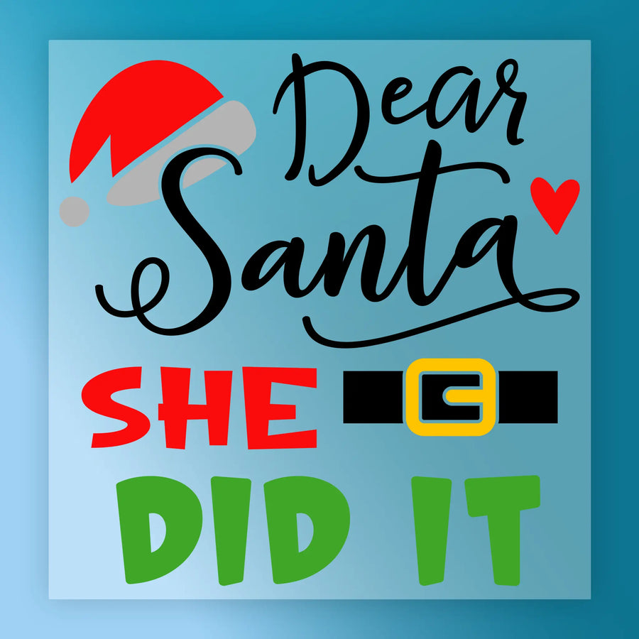 InkMerge's Dear Santa SHE DID IT Holiday Humor sign features a Santa hat, black belt, colorful text, and a red heart—perfect for DTF transfer or heat press holiday projects with a playful Christmas touch.