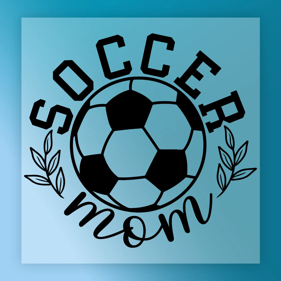a soccer ball with the text "SOCCER MOM" written around it, along with some leaves.