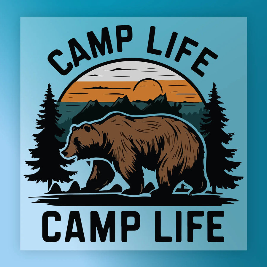 The Bear Mountain Sunset Design by InkMerge features a bear walking before pines and mountains at sunset, with “CAMP LIFE” above and below. Ideal for DTF transfers—add to your favorite tee using a heat press.
