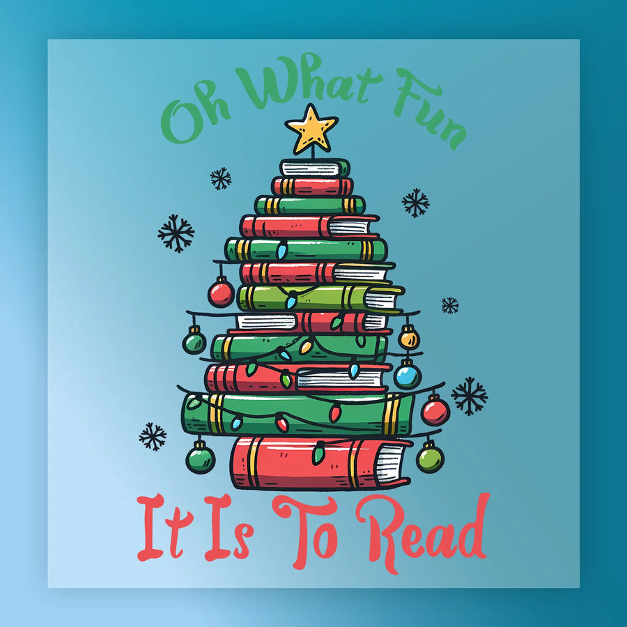 The InkMerge "Oh What Fun It Is To Read Book Tree" features stacked books as a tree, with ornaments, lights, and a star on a blue snowflake background—ideal for DTF transfer using your heat press.