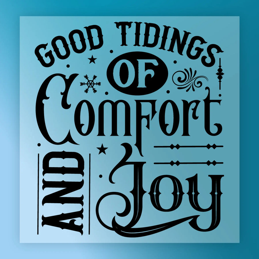 InkMerge's Good Tidings of Comfort and Joy Vintage Design features black decorative text with ornate flourishes and snowflakes on a light blue background—ideal for heat press or DTF transfer projects with a charming retro feel.