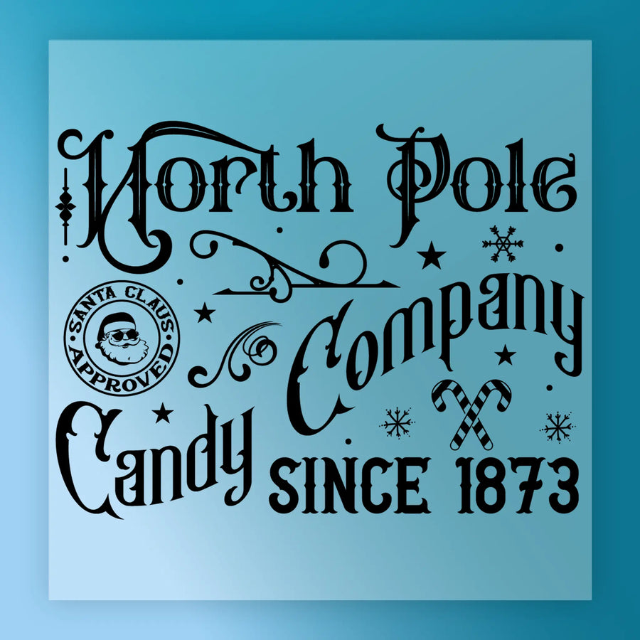 The InkMerge North Pole Candy Company Design - Heat Press Ready features ornate black text on light blue, snowflakes, candy canes, and a Santa-approved seal—ideal for DTF transfers with your heat press.