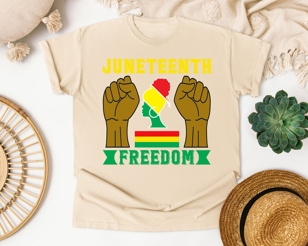 Juneteenth Freedom Fists graphic tee in Ivory Comfort Colors 1717