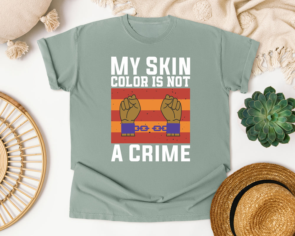 My Skin Color Is Not A Crime Fists graphic tee in Bay Comfort Colors 1717