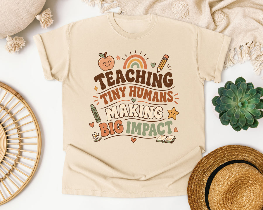 Teaching Tiny Humans Making Big Impact graphic tee in Ivory