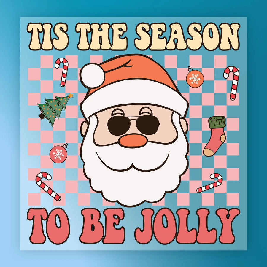 InkMerge’s “Tis The Season To Be Jolly Santa Humor” features a cool cartoon Santa in sunglasses and hat, surrounded by Christmas decorations on a pink and blue checkered background—great for holiday heat press transfers or DTF projects.