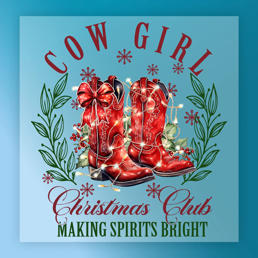 Illustration of red cowboy boots with a bow, Christmas lights, greenery, and snowflakes surrounded by green leaves. Text: "Making Spirits Bright." InkMerge Making Spirits Bright Cowboy Boots—perfect transfer for your heat press projects!.
