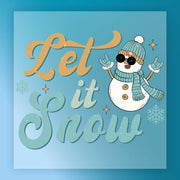 InkMerge’s Let It Snow Rock Snowman - Heat Press Ready features a cool snowman with sunglasses, beanie, scarf, and gloves making a rock gesture. With snowflakes and bold orange-blue "Let it Snow" script, it's perfect for holiday DTF or heat press projects.