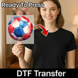 A woman holding a watercolor painting of a soccer ball, with a red arrow pointing to the ball.