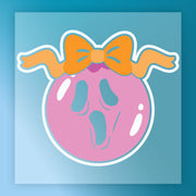 The Kawaii Ghost with Bow Design from InkMerge features a spooky ghost with a big orange bow on a pink balloon, set against a blue gradient—ideal for Halloween apparel or DTF transfer inspiration.