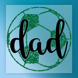 A graphic design featuring a soccer ball with the word "dad" written on it in a stylized font.