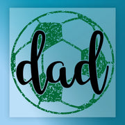 A graphic design featuring a soccer ball with the word "dad" written on it in a stylized font.