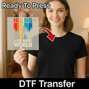 A woman in a black shirt holds a vibrant Retro Cat Silhouette Rainbow Design premium DTF film sheet from InkMerge, with an arrow pointing to her shirt. "Ready To Press" appears at the top and "heat press transfer DTF Transfer" at the bottom.