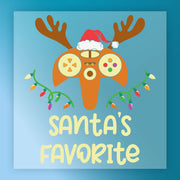 The Santa's Favorite Gamer shirt by InkMerge features a game controller with antlers, a Santa hat, and Christmas lights over "Santas Favorite" on blue—ideal for heat press or DTF transfer projects.