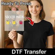 A woman is holding up a sign with the text "SOCCER MATH" and three cartoon soccer players, with a red arrow pointing to the sign.