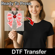 A woman in a black shirt holds an InkMerge Festive Bow with Reindeer Antlers and Red Nose DTF transfer sheet, marked "Ready To Press" at the top and "DTF Transfer" at the bottom—ideal for holiday shirt projects.