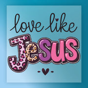 InkMerge’s Love Like Jesus Leopard Pattern features the phrase on a blue background. "Jesus" pops in bold, colorful leopard print with heart accents and two small hearts below, ideal for custom apparel transfers.