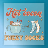 The InkMerge Hot Cocoa Fuzzy Socks Winter Design features a mug of cocoa, marshmallows, candy canes, a cookie, and cozy socks—ideal for DTF transfer designs with your heat press.