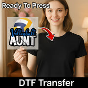 A woman holding a sign with the text "Volleyball Aunt" on it, with a red arrow pointing to her chest.
