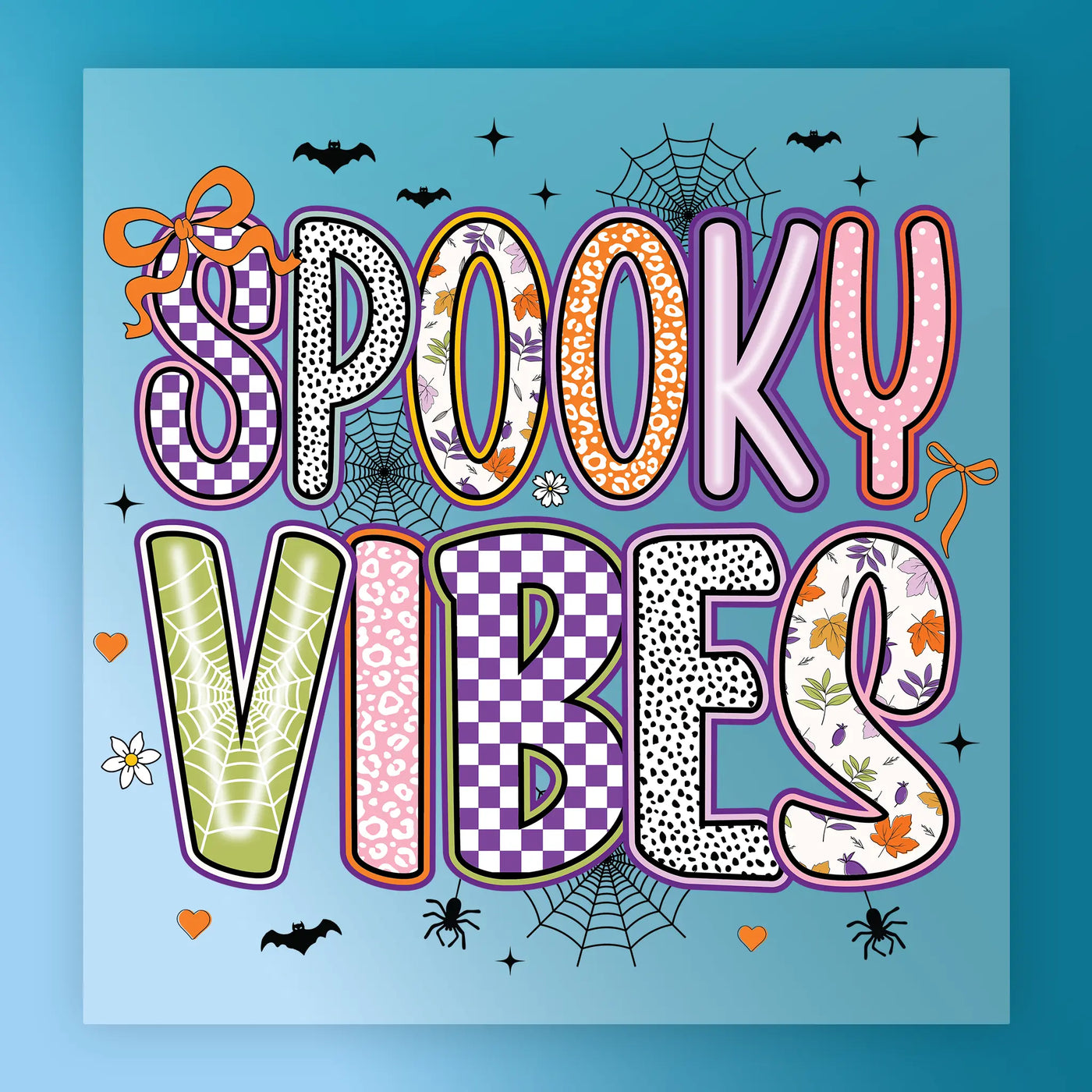 a vibrant and colorful design with the text "SPOKEY VIBES" prominently displayed. The design includes various decorative elements such as bats, spiderwebs, and flowers, creating a festive and spooky atmosphere.