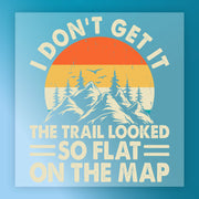 Good Times and Tan Lines Retro Sunset by InkMerge features a retro-style mountain scene with trees, two birds, and vibrant sunset. Text: I don’t get it. The trail looked so flat on the map. Ideal for heat press or DTF transfer designs.