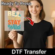 A smiling woman in a black t-shirt holds an InkMerge DTF transfer sheet with colorful Good Vibes Only Retro Text, ideal for custom apparel. An arrow points from the sheet to her shirt. The image reads Ready To Press and DTF Transfer.