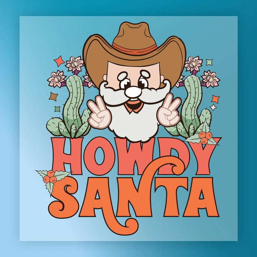 The InkMerge Howdy Santa Western Holiday Humor DTF transfer features a cartoon Santa with a cowboy hat, white beard, and glasses flashing peace signs among cacti, flowers, and stars—bold red text on blue makes it perfect for your heat press projects.