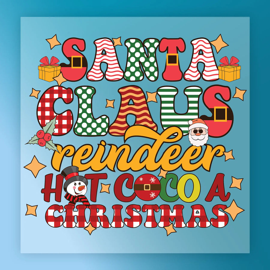 InkMerge’s Santa Claus Reindeer Hot Cocoa Christmas transfer features festive text, holly, gifts, Santa, and snowman icons on a blue background—perfect for your next holiday heat press project.