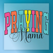 a colorful and stylized text that reads "PRAYING MAMA" in a decorative font.