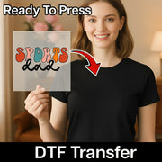 A smiling woman holding a sign with the word "SPORTS dad" on it, with a red arrow pointing to the sign.