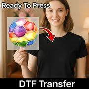 A woman holding a colorful watercolor painting of a soccer ball, with a red arrow pointing to her chest.
