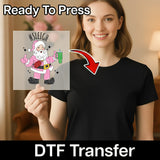 A smiling woman in black holds an InkMerge DTF transfer sheet with the #SLEIGH Santa Humor Design and a green drink. Bold text reads Ready To Press and DTF Transfer—ideal as an ugly sweater holiday shirt! An arrow highlights the festive design.