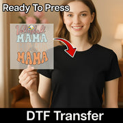 A smiling woman holding a sign with text that says "Volleyball Mama" and a red arrow pointing to her chest.