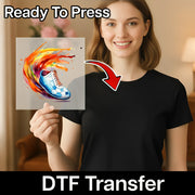 A woman holding a transparent sheet with a colorful, abstract design on it, and there is text that says "Ready To Press" and "DTF Transfer" below the image.