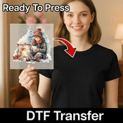 A smiling woman in a black shirt holds InkMerge's Nostalgic Christmas Scene DTF transfer, showing a child by the fireplace with a mug. Ready To Press—this festive design is perfect for custom holiday apparel.