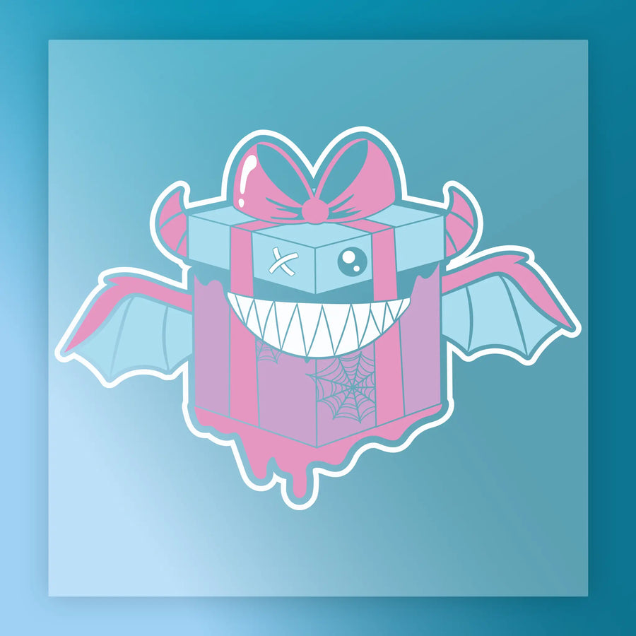 The InkMerge Whimsical Bat Wing Gift Box Design, featuring a cobweb pattern, sharp teeth, and a button eye, adds spooky flair to Halloween crafts—ideal for DTF transfer projects on a blue background.