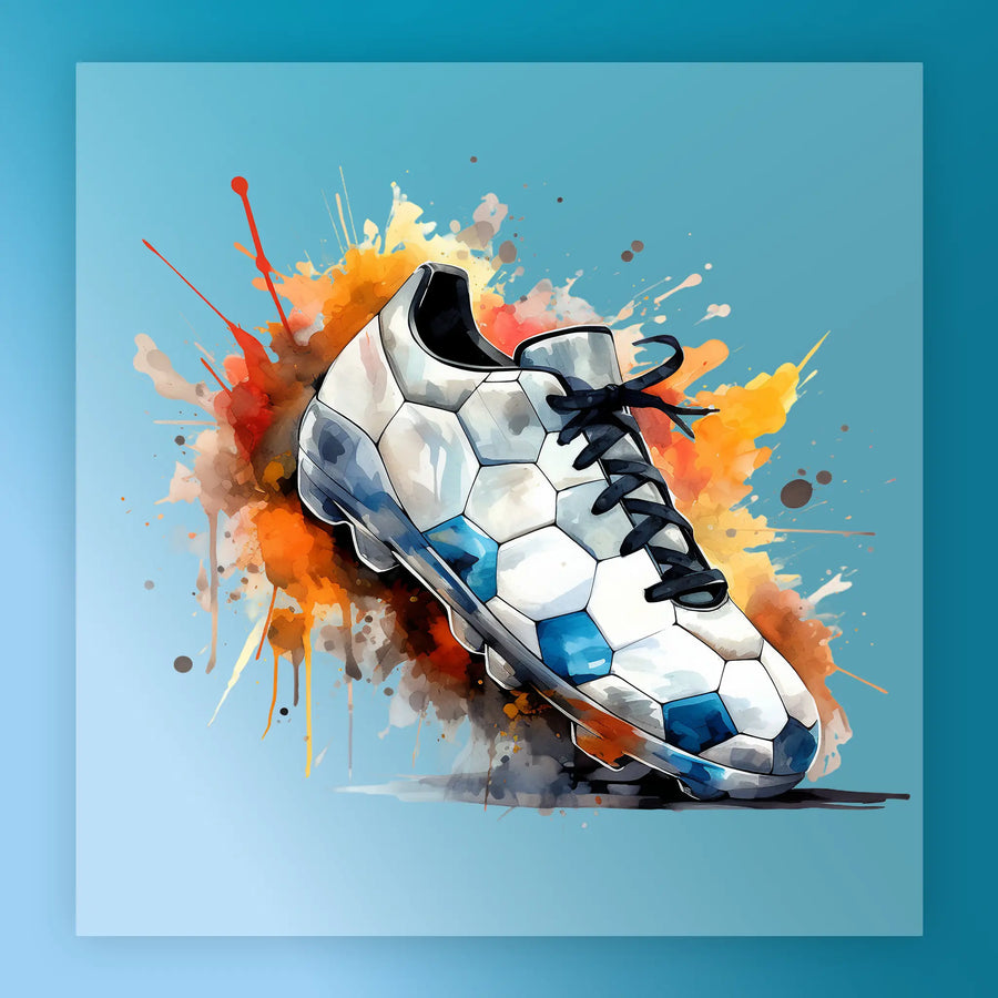 A white and blue soccer cleat with a black lacing system is depicted in the center of the image, surrounded by splashes of orange and yellow paint against a blue background.