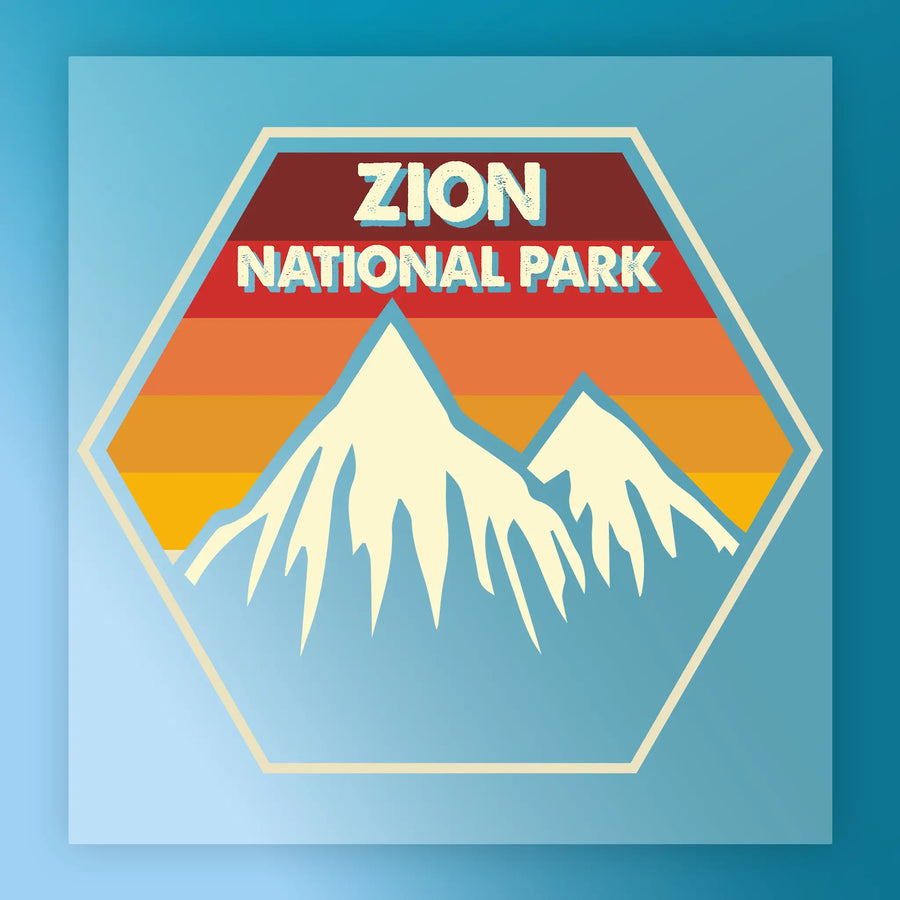 The Zion National Park Retro Mountain Design by InkMerge features stylized white mountains on layered red, orange, and yellow stripes with bold retro text—all on a blue hexagonal badge. Heat press ready for custom apparel or DTF transfers.