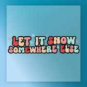 The Let It Snow Somewhere Else Custom Design by InkMerge features large, playful, colorful letters on a blue background with pastel stars—perfect for custom apparel using your favorite heat press method or DTF transfers.