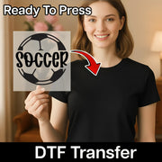 A woman holding a sign with the word "SOCCER" on it, with a red arrow pointing to the sign.