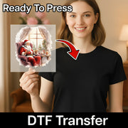 A woman in a black shirt holds an InkMerge Traditional Santa Relaxing Scene premium DTF film by a window with gifts and a Christmas tree. Text: Ready To Press, holiday heat press transfer.