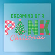 InkMerge’s “Dreaming of a Pink Christmas” DTF transfer features festive pink and green plaid lettering, with the I as a Christmas tree. Perfect for your heat press this holiday season on a light blue background.