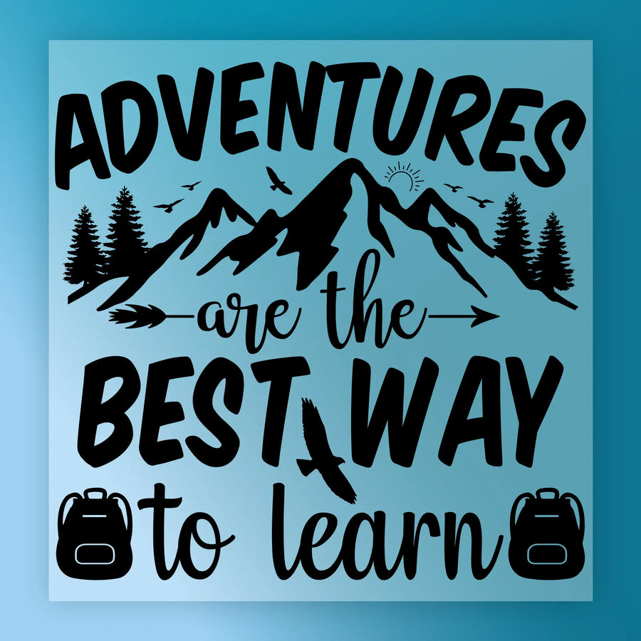 InkMerge's "Adventures Are the Best Way to Learn" features black text on blue with mountains, trees, birds, a sun, and backpacks—perfect for full-color printing or a ready-to-press DTF transfer.