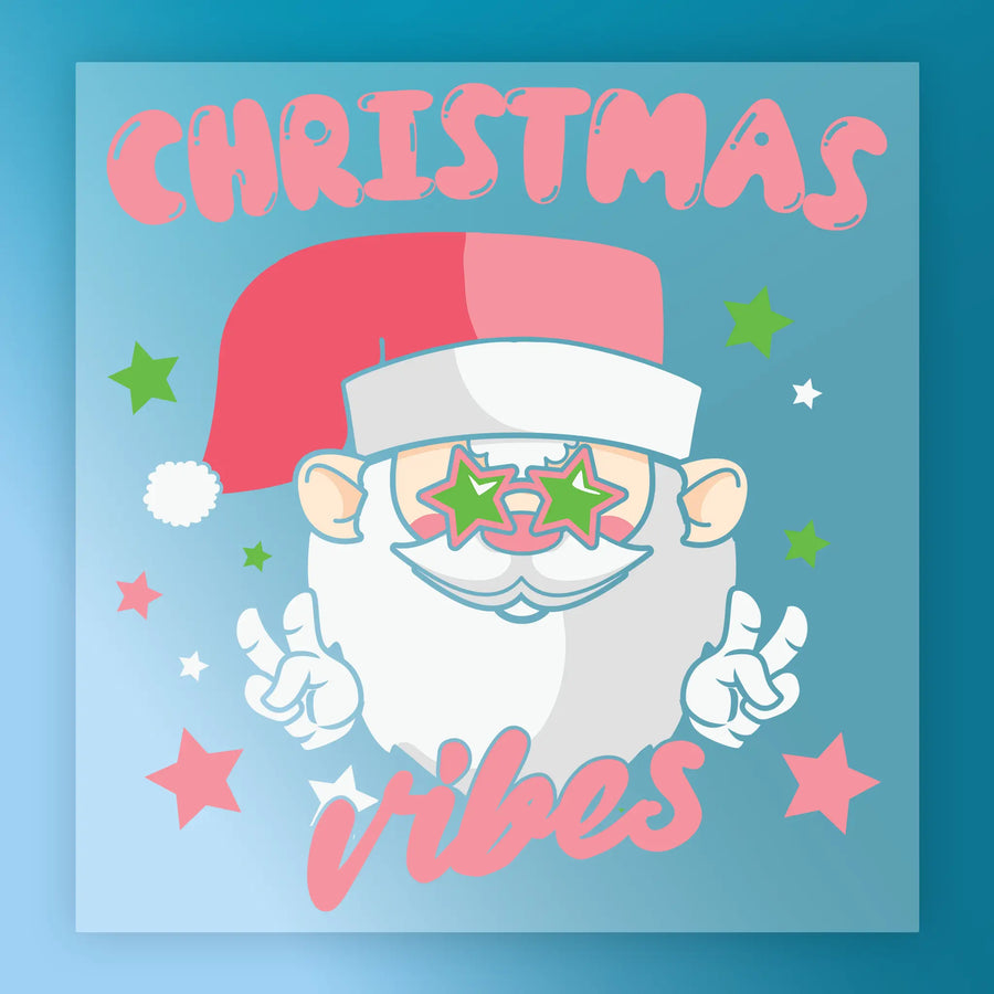 The Christmas Vibes Santa Design by InkMerge features a cartoon Santa with star-shaped glasses flashing peace signs and pink “CHRISTMAS vibes” text—ideal as a DTF transfer for your next festive shirt project.