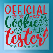 InkMerge's Cookie Tester Holiday Design features "Official Cookie Tester" in festive red and green with a gingerbread man, cookie, carrot, heart, and snowflakes on a light blue background—ready-to-press DTF transfer for the holidays.