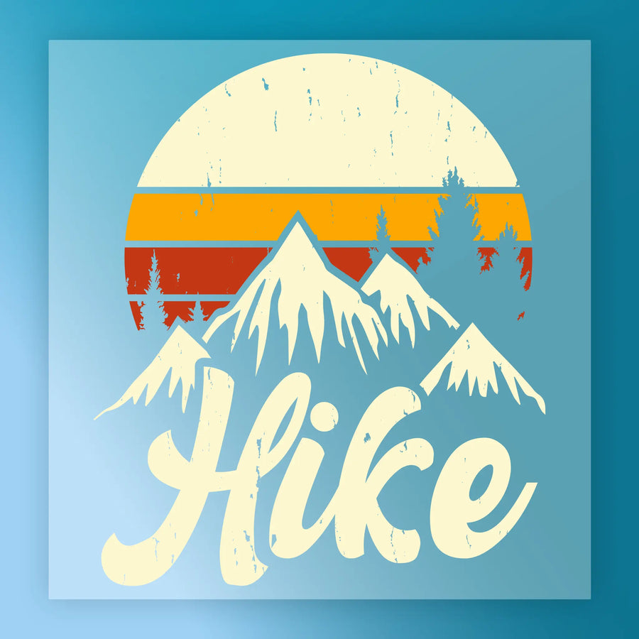 The InkMerge Take A Hike Retro Sunset Design features snow-capped mountains, pine trees, a vintage sunset backdrop, and bold “Hike” text with a worn effect—ideal for heat press transfer projects.
