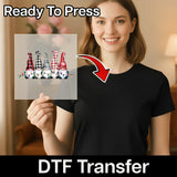 A woman holding a clear plastic sheet with a graphic of five gnomes on it, and there is a red arrow pointing to the sheet.
