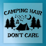 The InkMerge Camping Hair Don't Care Design features trees, tent, campfire, stars, and crescent moon with the phrase above and below—perfect for heat press or DTF transfer on a blue background.