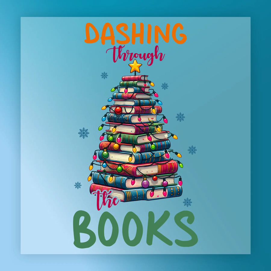 The InkMerge In My Bookish Era Christmas Design shows a tree of stacked books with colorful lights, a star topper, and snowflakes in the background. “Dashing through the books” text. Ideal for DTF transfer or heat press projects.